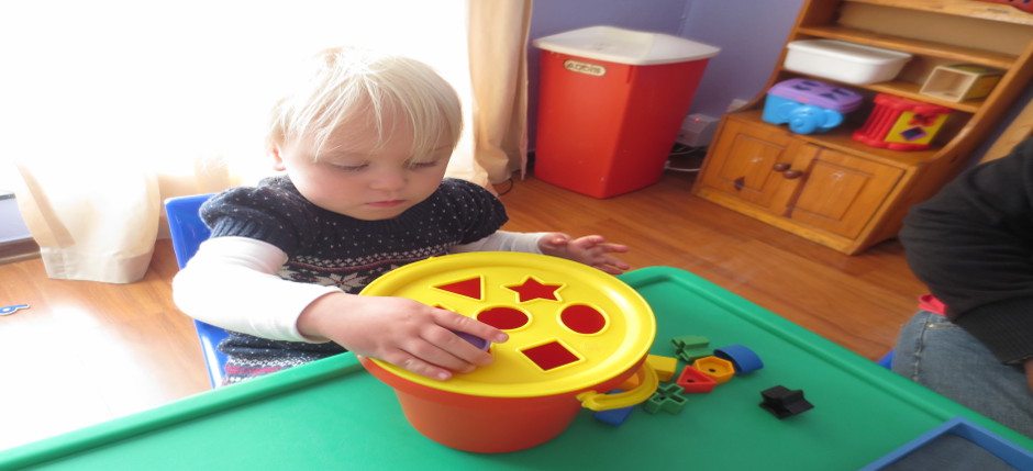 Child sorting Shapes
